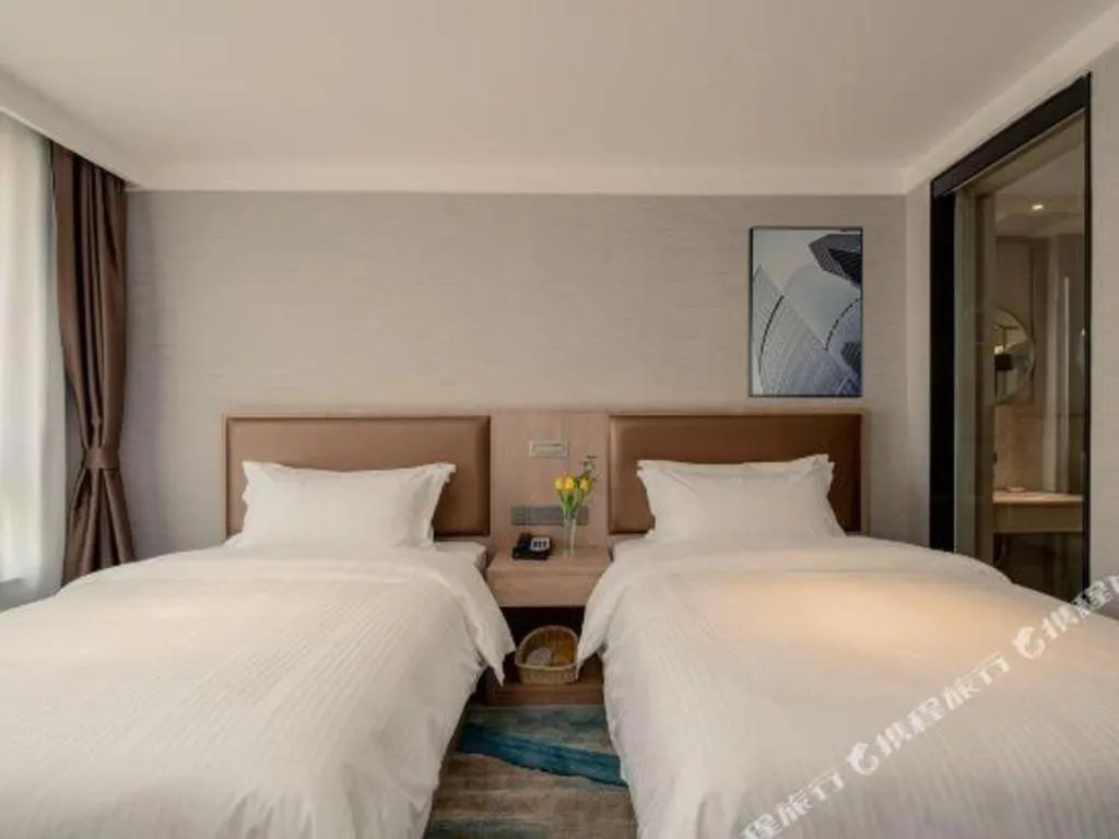 Bed in GreenTree Inn Ganzhou Sankang Temple DaRunFa Express Hotel