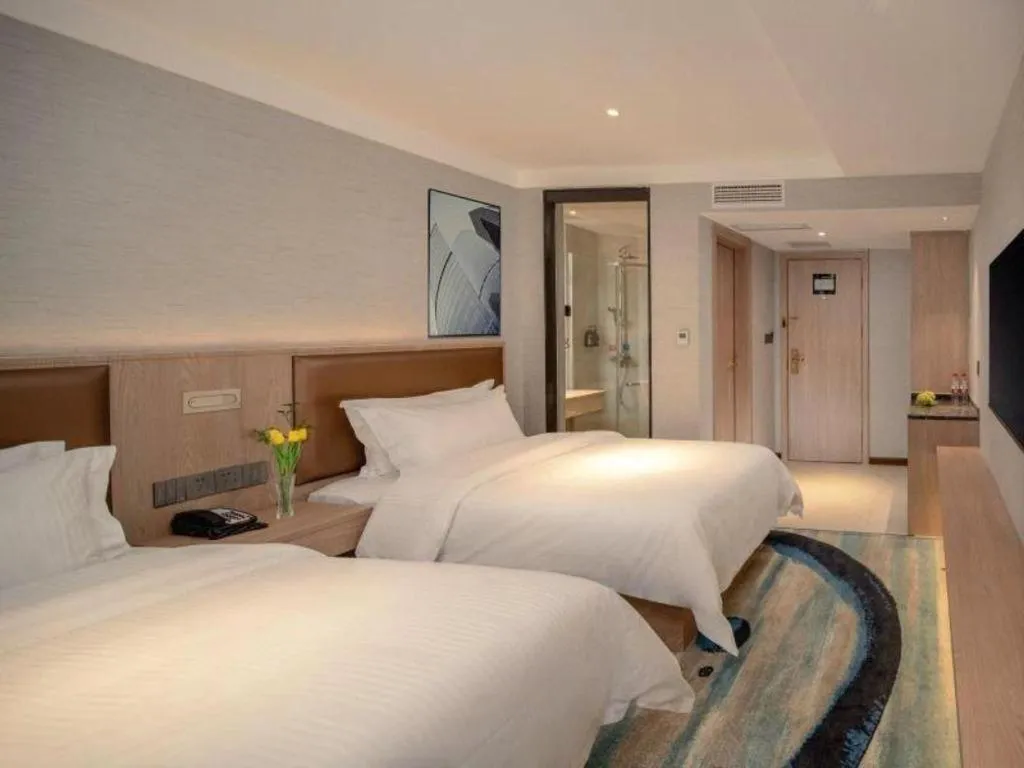 Bed in GreenTree Inn Ganzhou Sankang Temple DaRunFa Express Hotel