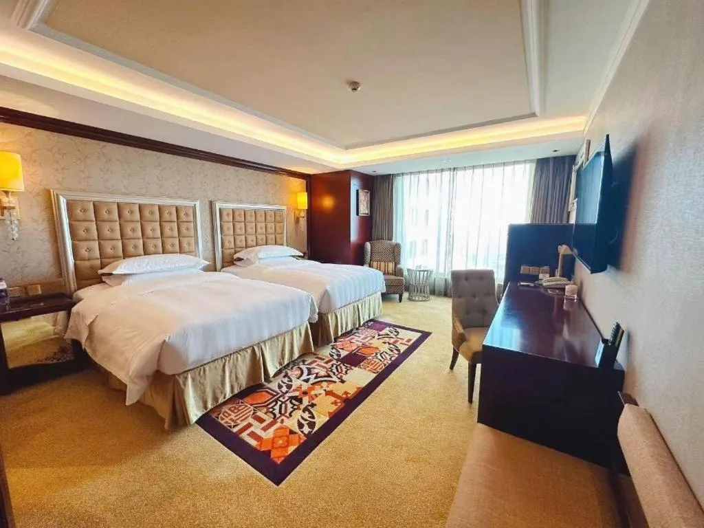Bed in Shenyang Royal Wan Xin Hotel
