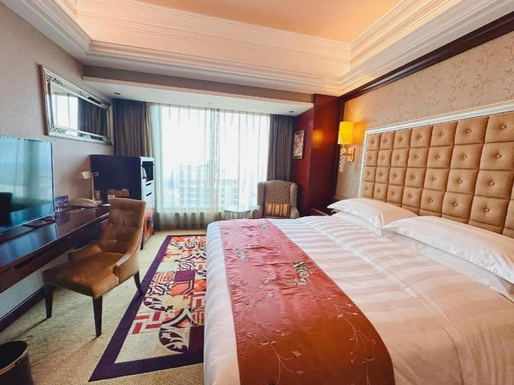 Bed in Shenyang Royal Wan Xin Hotel