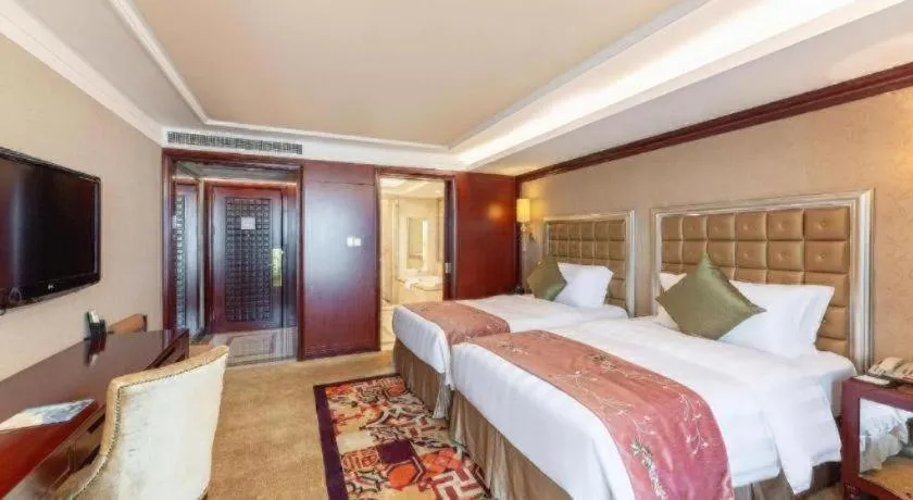 Bed in Shenyang Royal Wan Xin Hotel