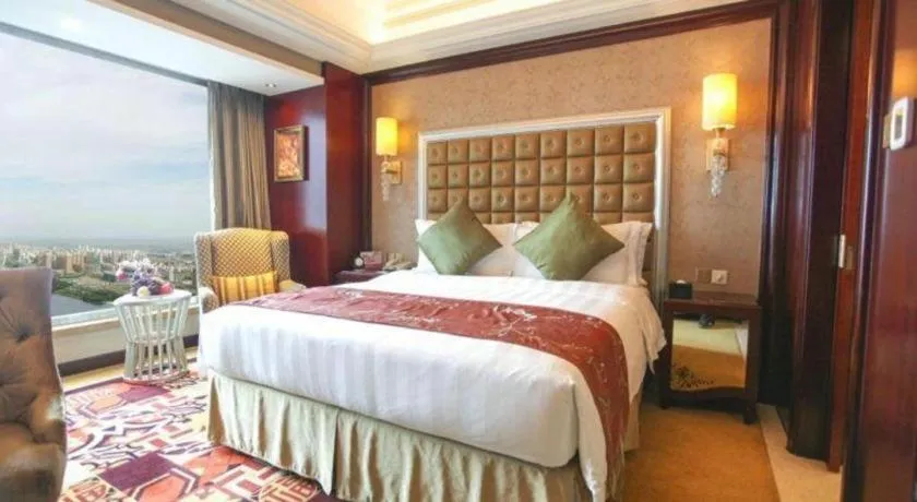 Bed in Shenyang Royal Wan Xin Hotel