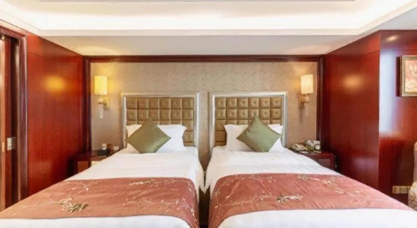 Bed in Shenyang Royal Wan Xin Hotel