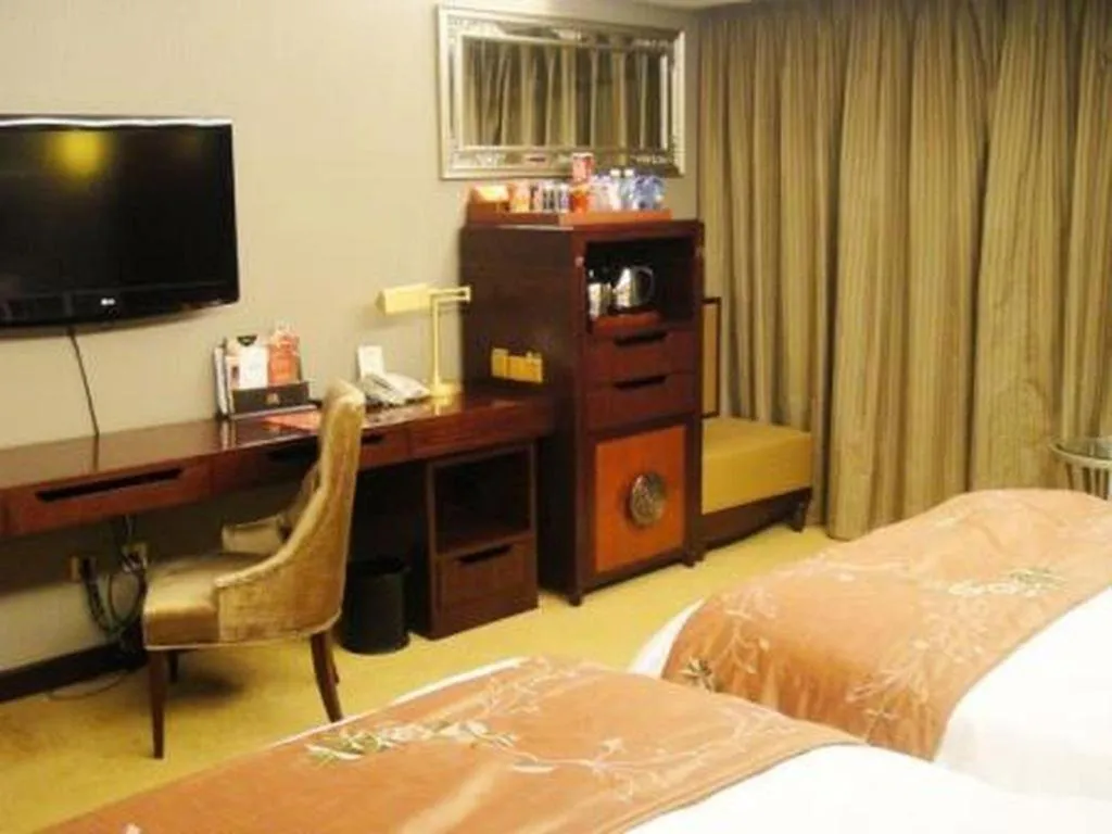 Bed in Shenyang Royal Wan Xin Hotel