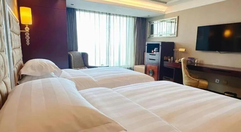Bed in Shenyang Royal Wan Xin Hotel