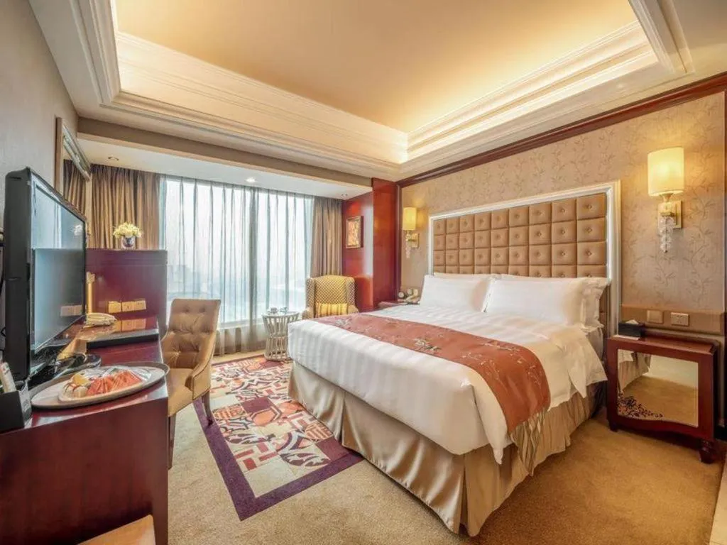 Bed in Shenyang Royal Wan Xin Hotel