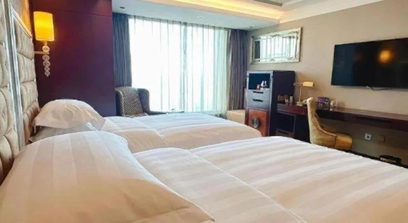 Bed in Shenyang Royal Wan Xin Hotel