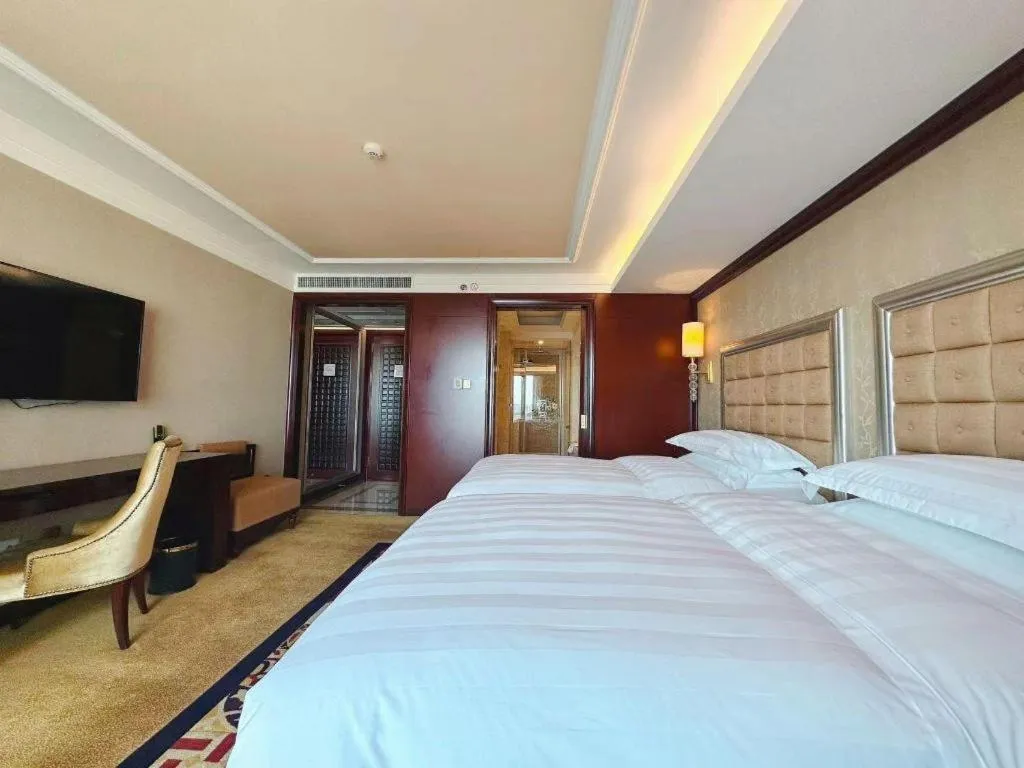 Bed in Shenyang Royal Wan Xin Hotel