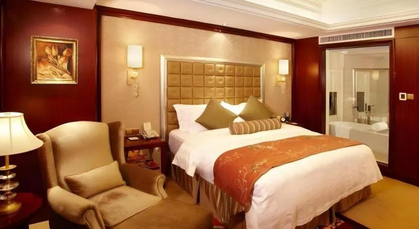 Bed in Shenyang Royal Wan Xin Hotel