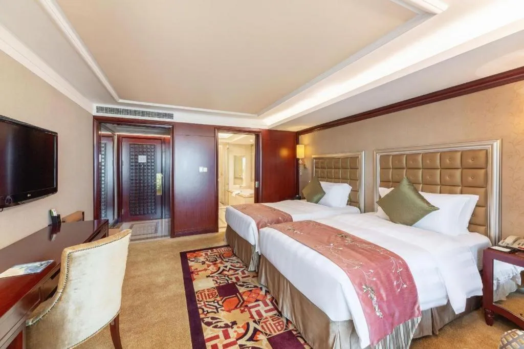 Bed in Shenyang Royal Wan Xin Hotel