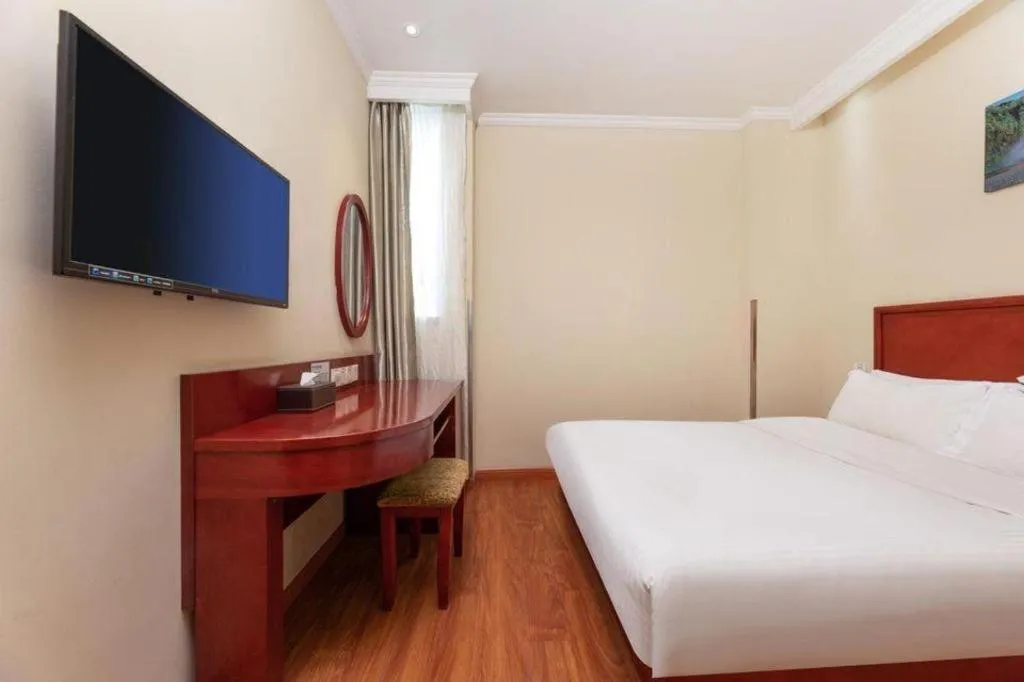 Bed in GreenTree Inn Suzhou Railway Station North Square Haobainian Wedding Dress City Express Hotel