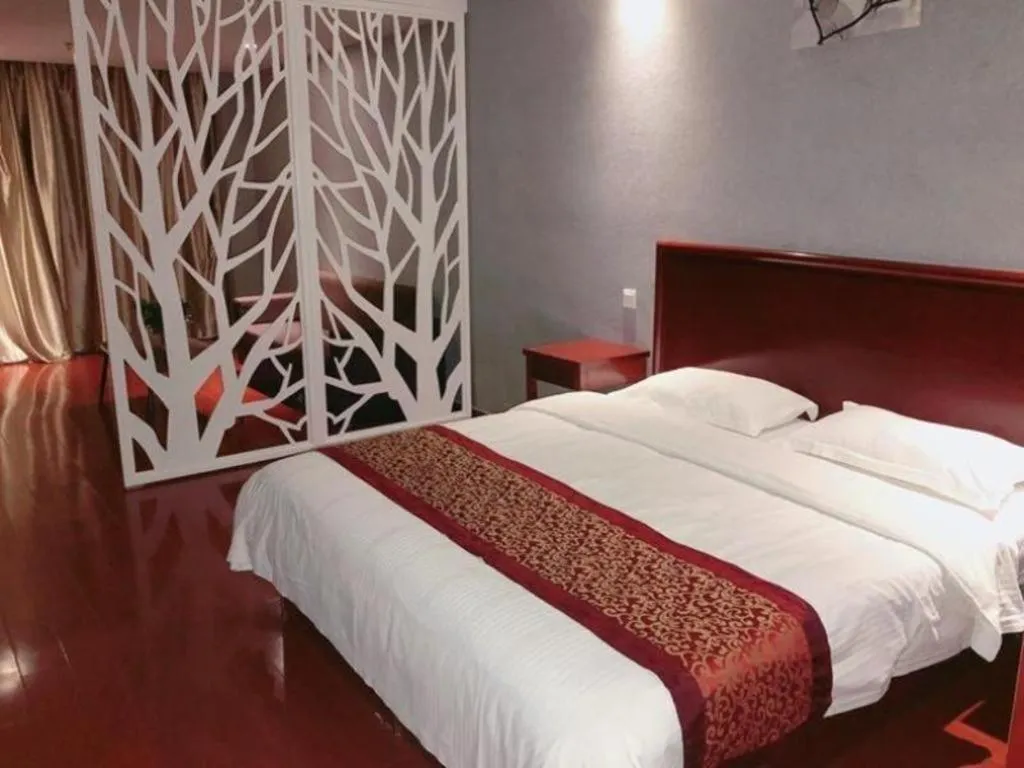 Bed in GreenTree Inn Suzhou Shihu Suli Road Express Hotel