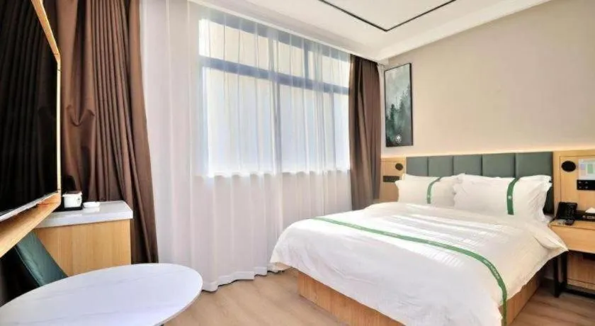 Bed in GreenTree Inn Suzhou Shihu Suli Road Express Hotel