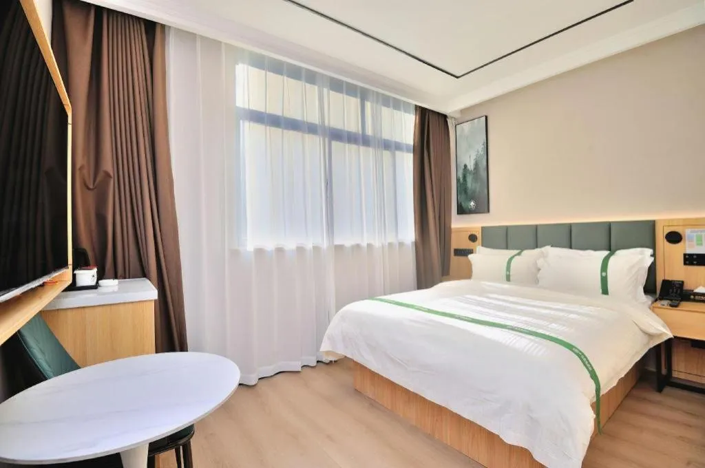 Bed in GreenTree Inn Suzhou Shihu Suli Road Express Hotel
