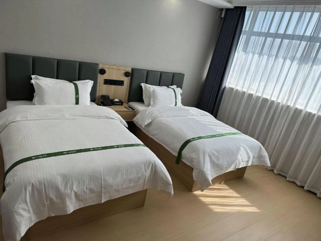 Bed in GreenTree Inn Suzhou Shihu Suli Road Express Hotel