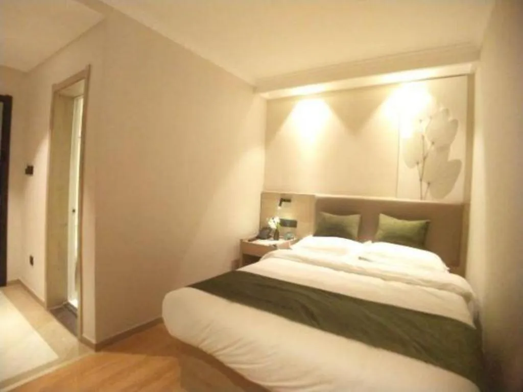 Bed in GreenTree Inn Xuzhou High Speed Railway Station Express Hotel