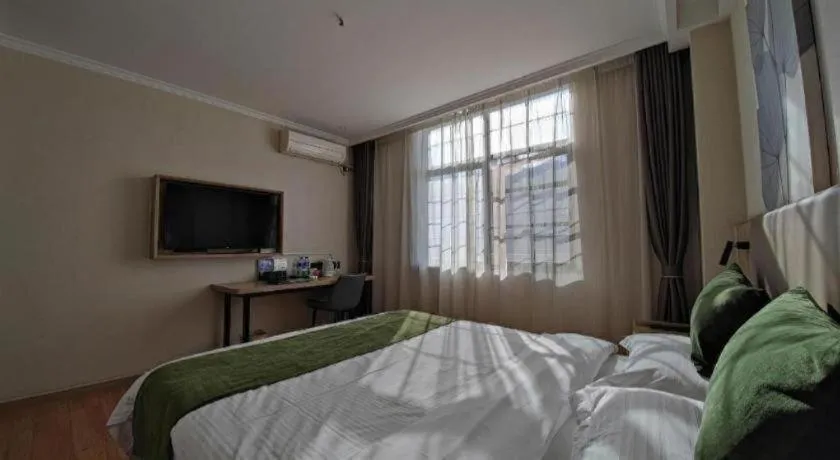 Bed in GreenTree Inn Xuzhou High Speed Railway Station Express Hotel