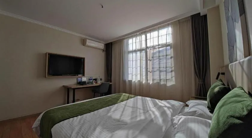 Bed in GreenTree Inn Xuzhou High Speed Railway Station Express Hotel