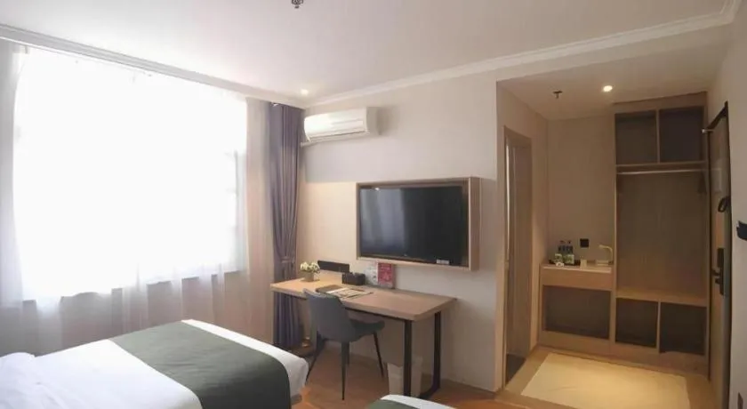 Bed in GreenTree Inn Xuzhou High Speed Railway Station Express Hotel