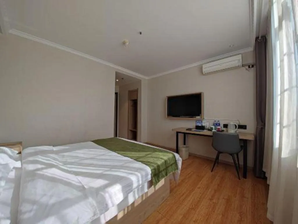 Bed in GreenTree Inn Xuzhou High Speed Railway Station Express Hotel