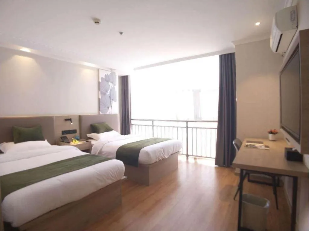 Bed in GreenTree Inn Xuzhou High Speed Railway Station Express Hotel
