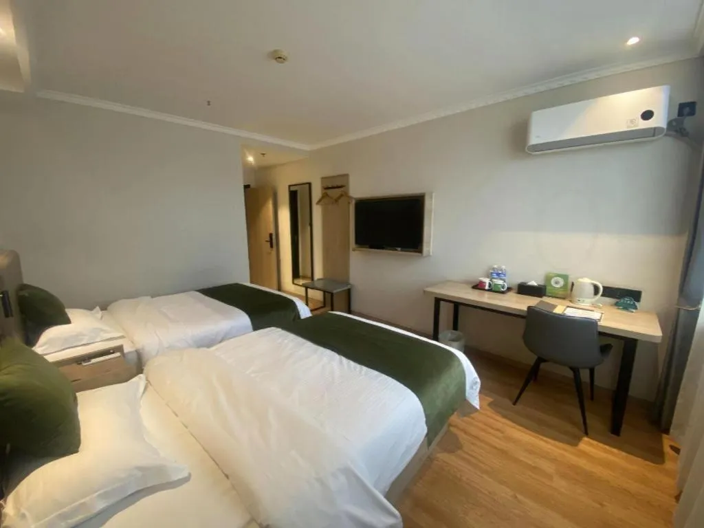 Bed in GreenTree Inn Xuzhou High Speed Railway Station Express Hotel