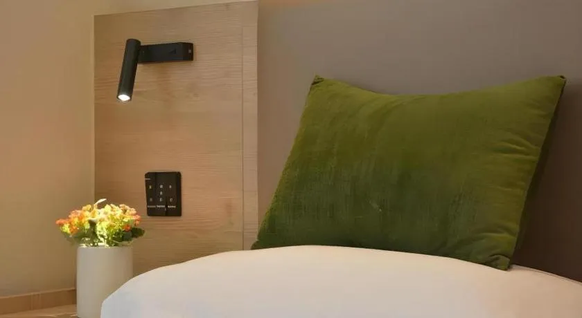 Bed in GreenTree Inn Xuzhou High Speed Railway Station Express Hotel