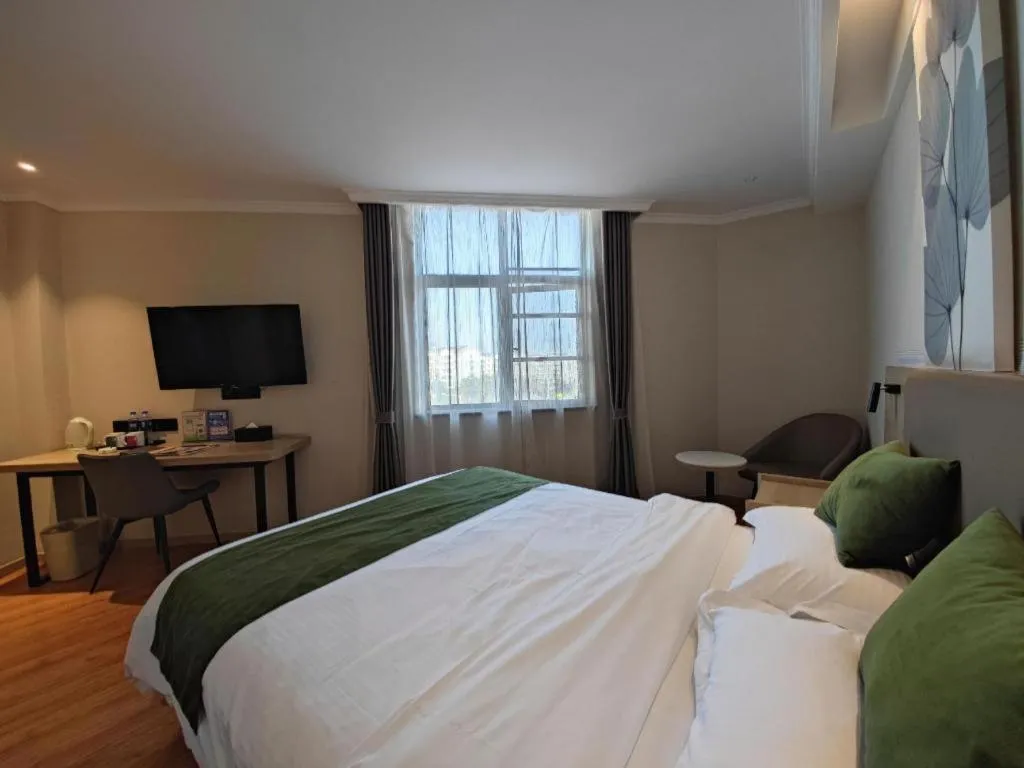 Bed in GreenTree Inn Xuzhou High Speed Railway Station Express Hotel