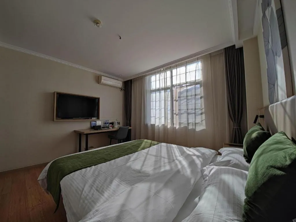 Bed in GreenTree Inn Xuzhou High Speed Railway Station Express Hotel