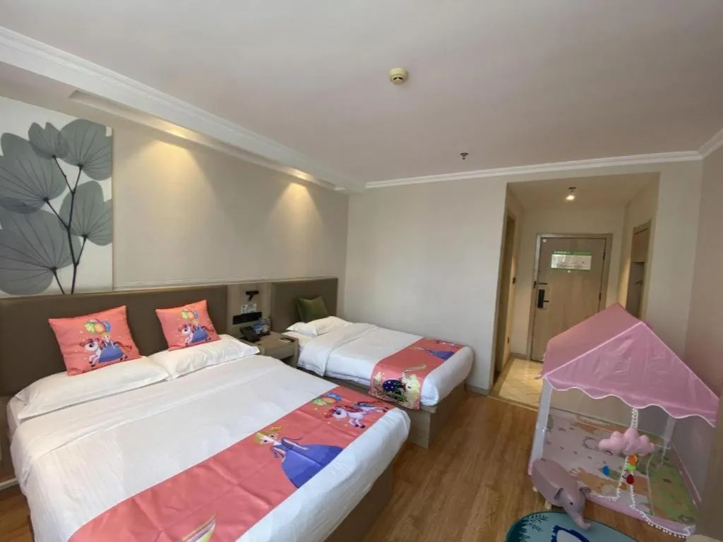 Bed in GreenTree Inn Xuzhou High Speed Railway Station Express Hotel