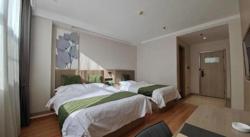 Bed in GreenTree Inn Xuzhou High Speed Railway Station Express Hotel