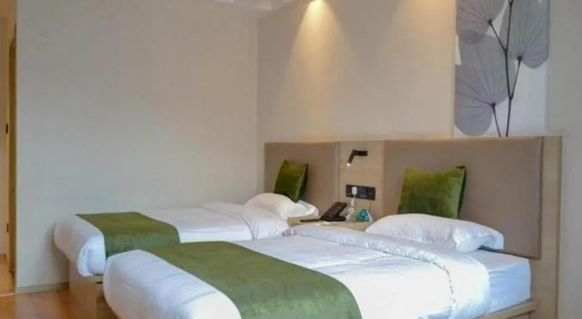 Bed in GreenTree Inn Xuzhou High Speed Railway Station Express Hotel