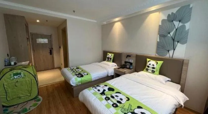 Bed in GreenTree Inn Xuzhou High Speed Railway Station Express Hotel