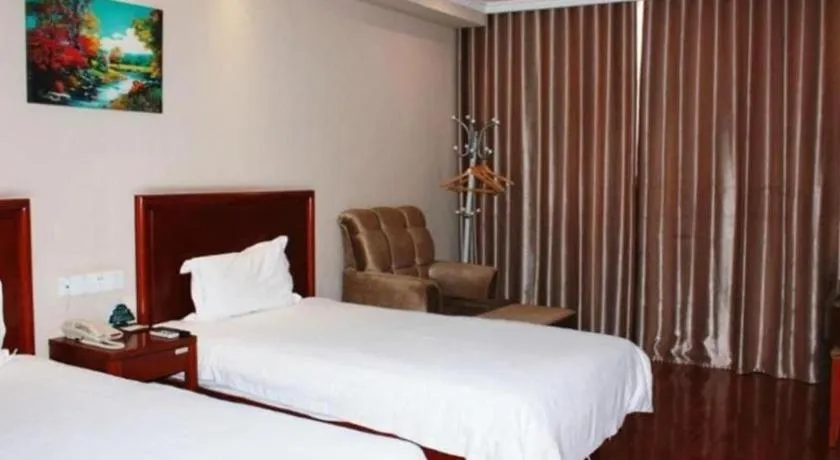 Bed in GreenTree Inn Xuzhou High Speed Railway Station Express Hotel