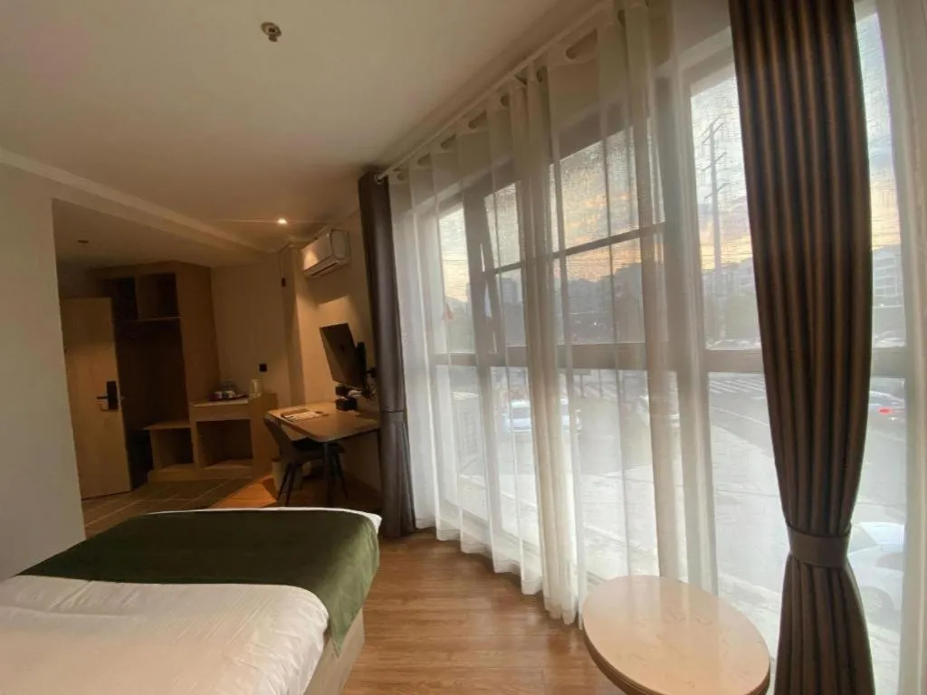 Bed in GreenTree Inn Xuzhou High Speed Railway Station Express Hotel