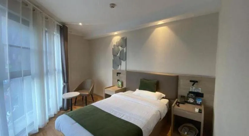 Bed in GreenTree Inn Xuzhou High Speed Railway Station Express Hotel