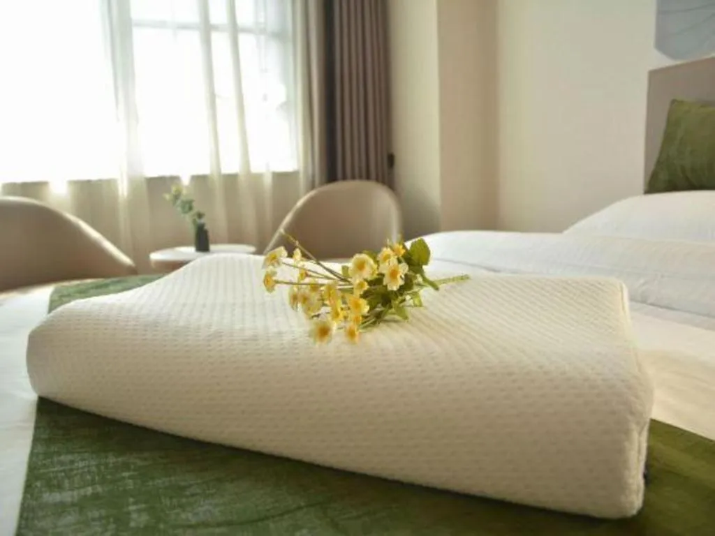 Bed in GreenTree Inn Xuzhou High Speed Railway Station Express Hotel