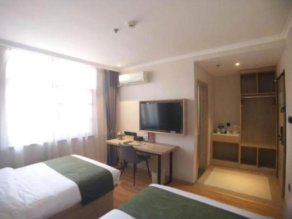 Bed in GreenTree Inn Xuzhou High Speed Railway Station Express Hotel