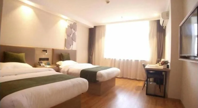 Bed in GreenTree Inn Xuzhou High Speed Railway Station Express Hotel