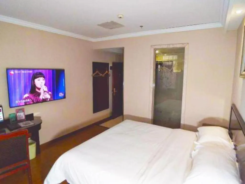 Bed in GreenTree Inn Jiangsu Wuxi Xishan DongTing Erquan East Road XinGuang Newly Estate Express Hotel