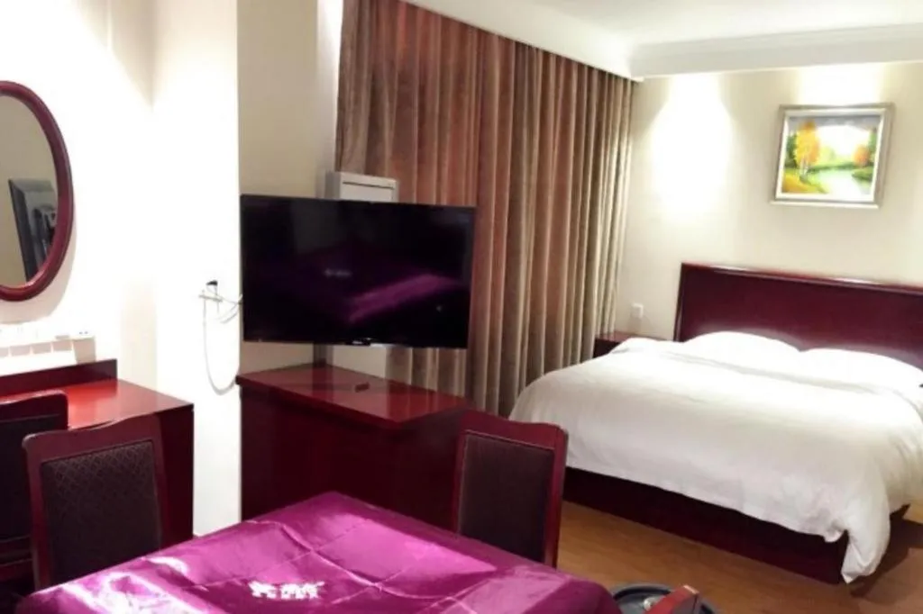 Bed in GreenTree Inn Jiangsu Wuxi Xishan DongTing Erquan East Road XinGuang Newly Estate Express Hotel
