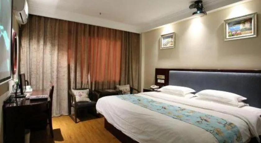 Bed in GreenTree Inn Jiangsu Wuxi Xishan DongTing Erquan East Road XinGuang Newly Estate Express Hotel