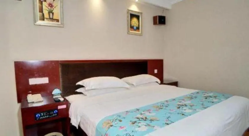 Bed in GreenTree Inn Jiangsu Wuxi Xishan DongTing Erquan East Road XinGuang Newly Estate Express Hotel