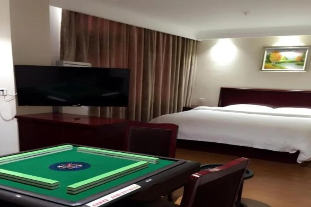 Bed in GreenTree Inn Jiangsu Wuxi Xishan DongTing Erquan East Road XinGuang Newly Estate Express Hotel