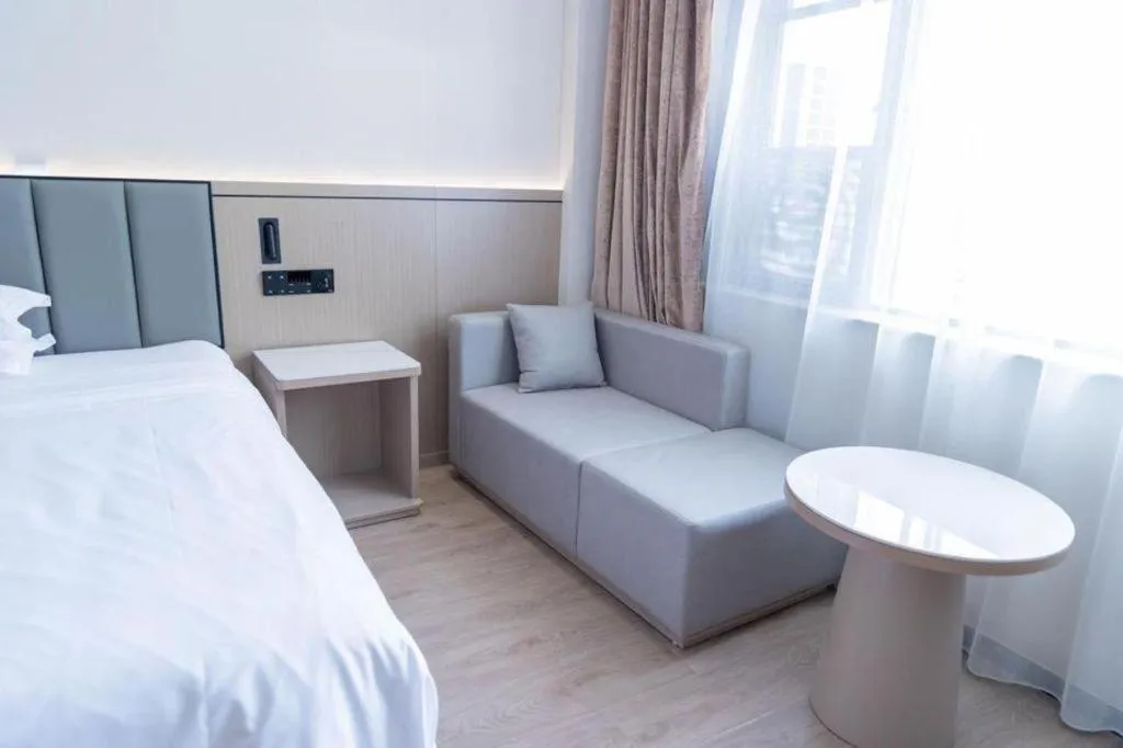 Bed in GreenTree Inn Jiangsu Wuxi Xishan DongTing Erquan East Road XinGuang Newly Estate Express Hotel