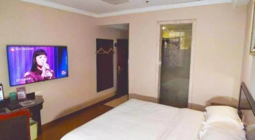 Bed in GreenTree Inn Jiangsu Wuxi Xishan DongTing Erquan East Road XinGuang Newly Estate Express Hotel