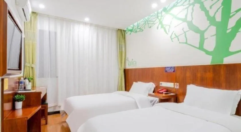 Bed in Vatica ShangHai Pudong Airport Disney Huaxia(E) Road Metro Station Hotel .