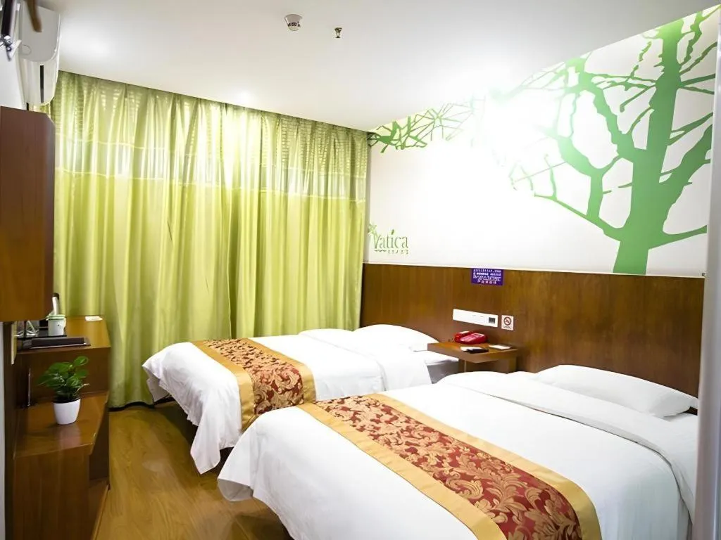 Bed in Vatica ShangHai Pudong Airport Disney Huaxia(E) Road Metro Station Hotel .