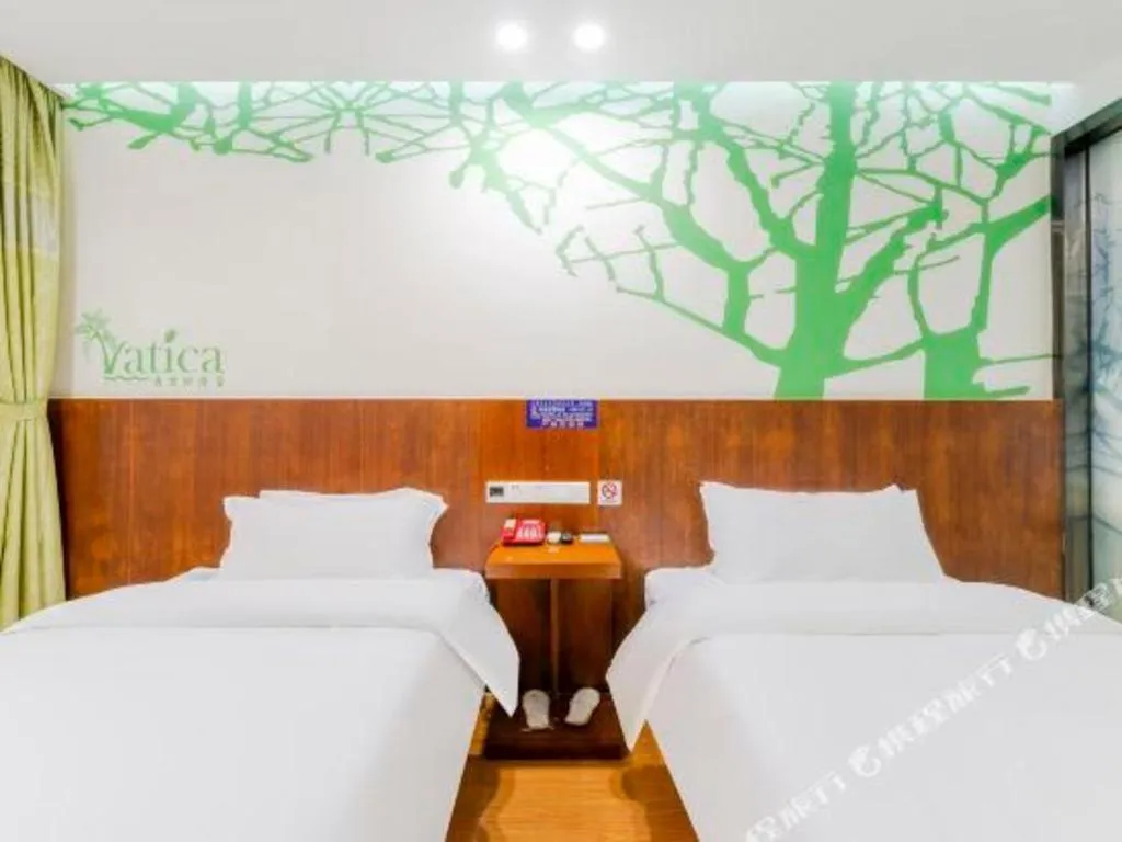 Bed in Vatica ShangHai Pudong Airport Disney Huaxia(E) Road Metro Station Hotel .