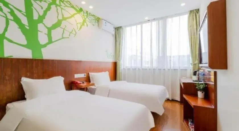 Bed in Vatica ShangHai Pudong Airport Disney Huaxia(E) Road Metro Station Hotel . Bed in Vatica ShangHai Pudong Airport Disney Huaxia(E) Road Metro Station Hotel .